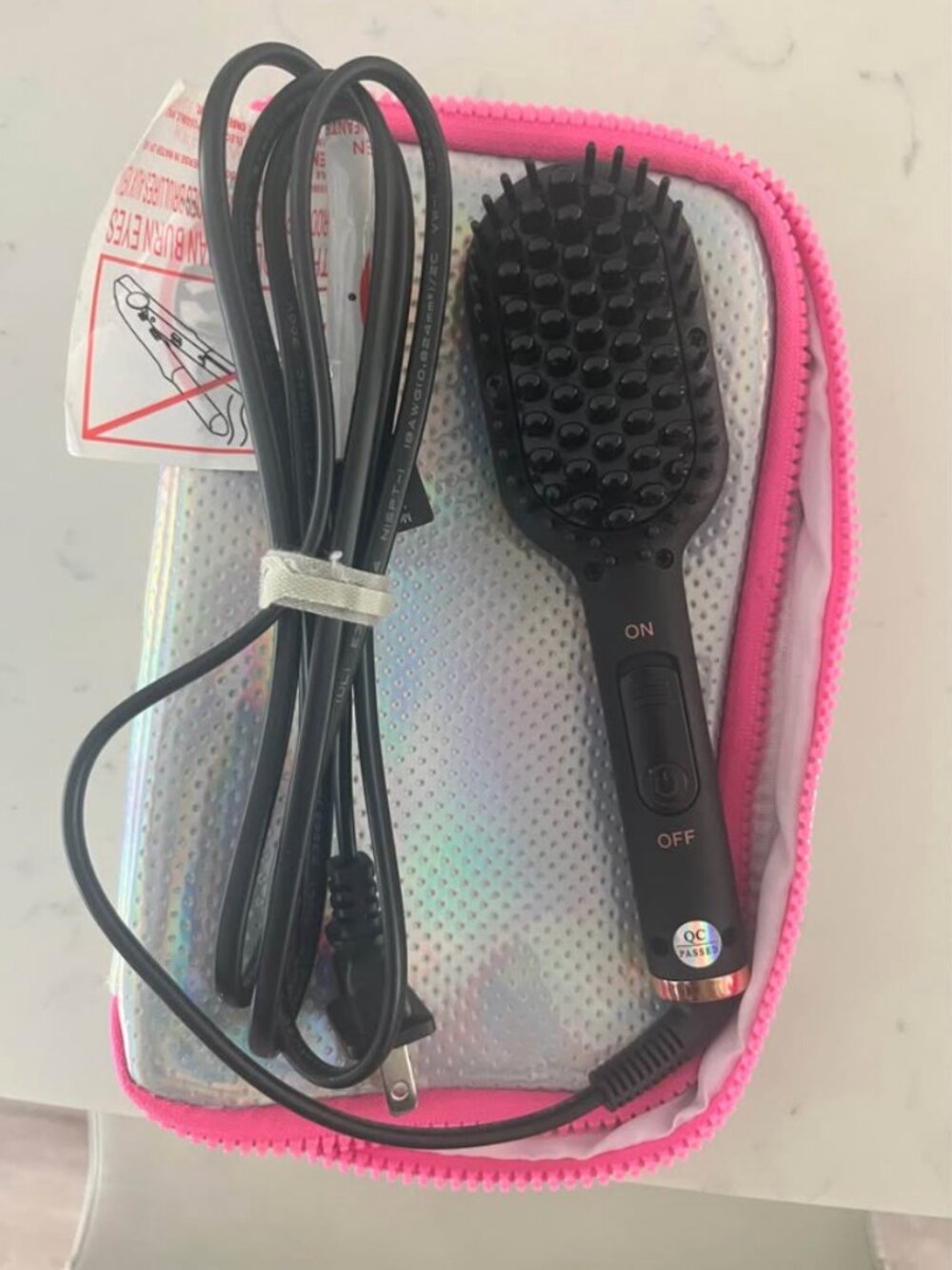Amika mini hair straightener brush. Perfect for bands and ends. Barely used,